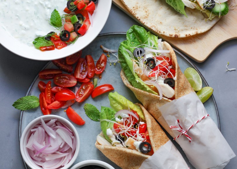 photo of Tzatziki sauce and gyros(Greek sandwich)