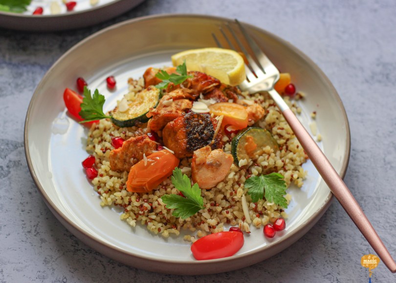 Photo of Salmon cooked with tomatoes and zucchini.