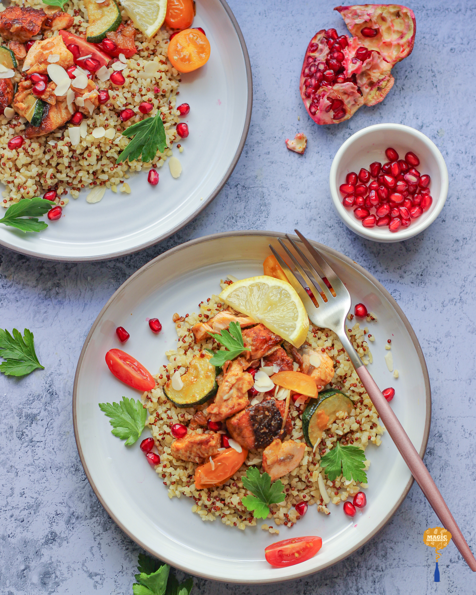 photo of Salmon cooked with tomatoes and zucchini.