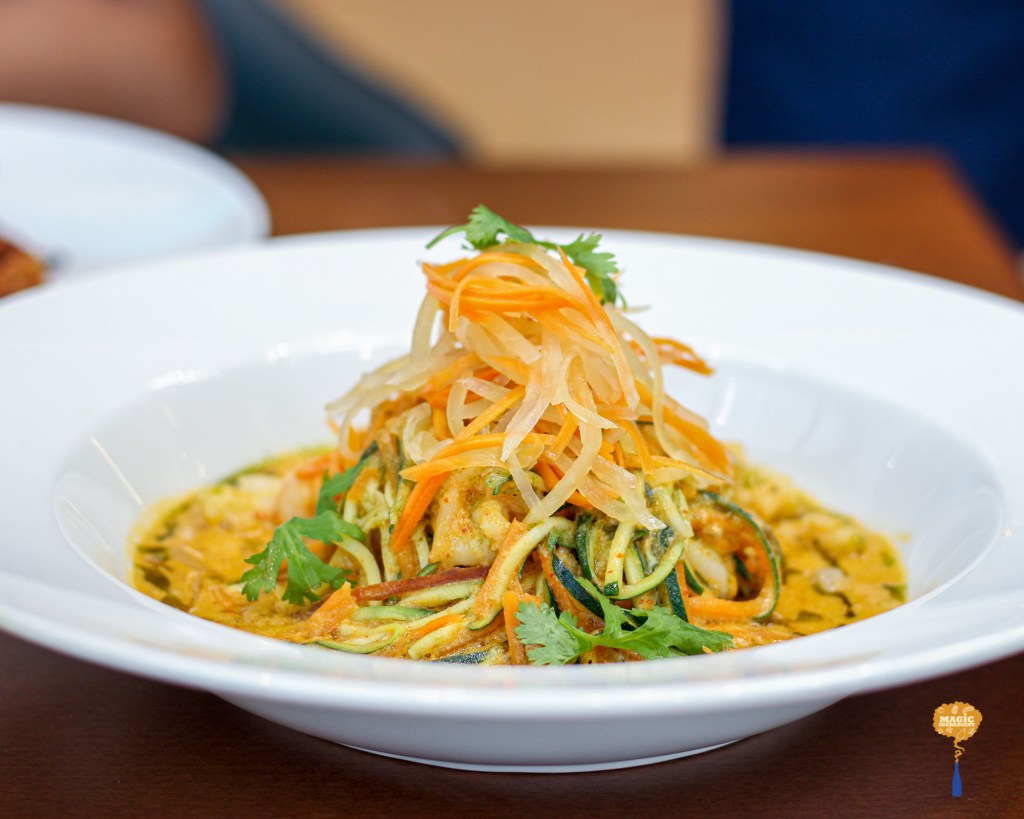 photo of Thai prawn curry with zoodles and crunchy pickled papaya salad