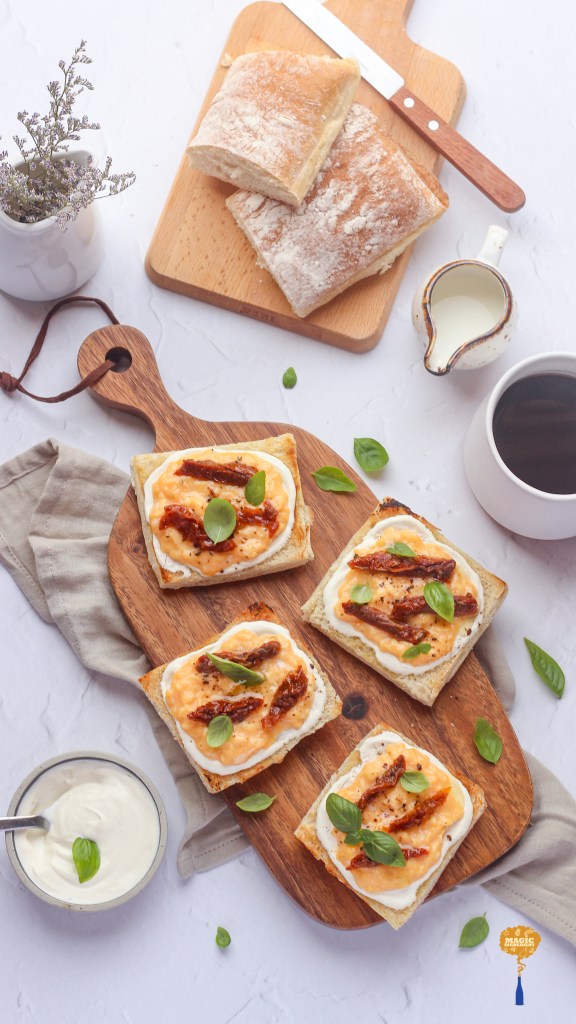Ciabatta toasts with ricotta and scrambled eggs