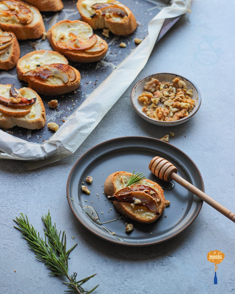 Cinnamon roasted pear crostini with thyme and goat cheese