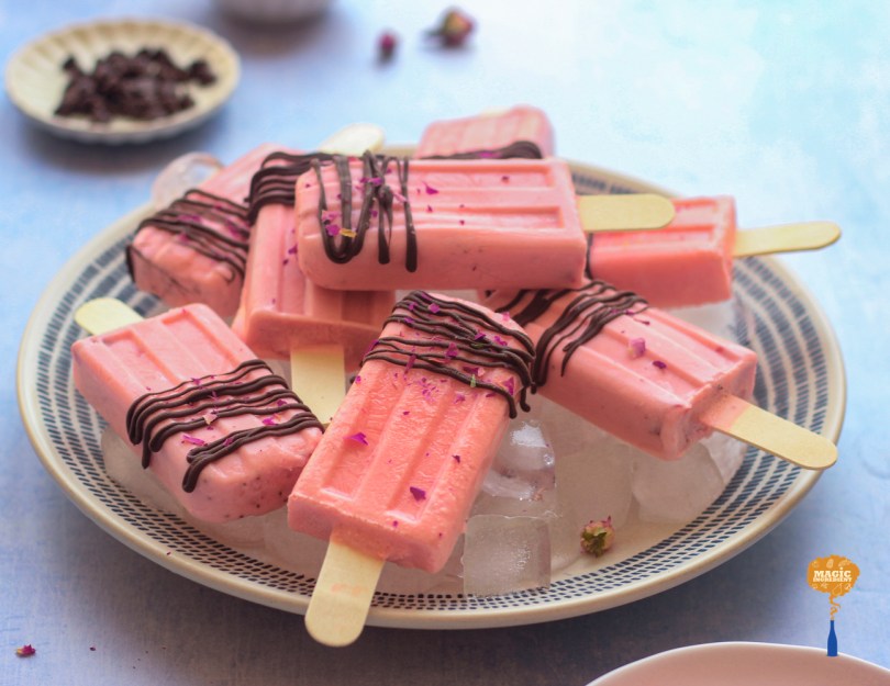 Strawberry cream pops with chocolate drizzle