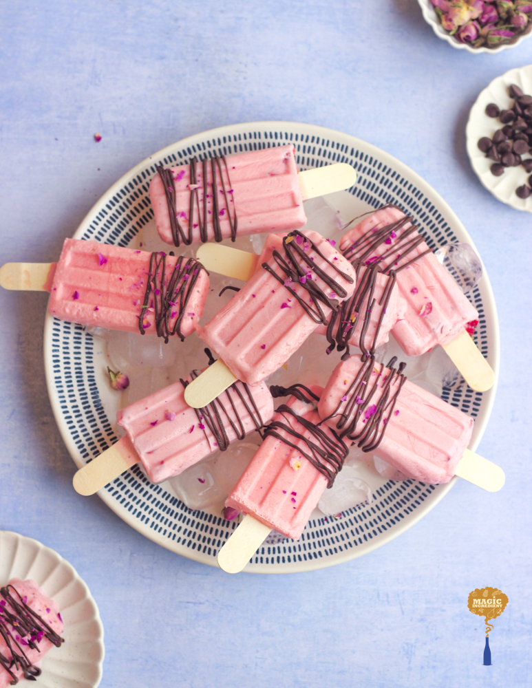 Strawberry cream pops with chocolate drizzle
