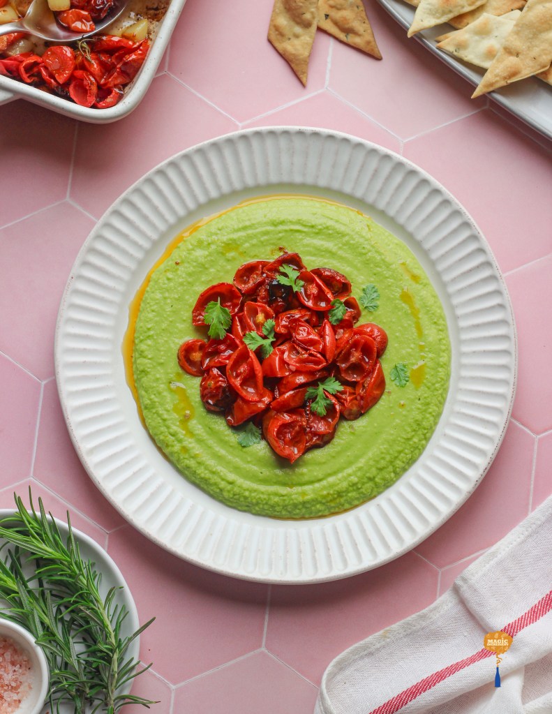 herb hummus with roasted cherry tomatoes and Rosemary pink salt crackers