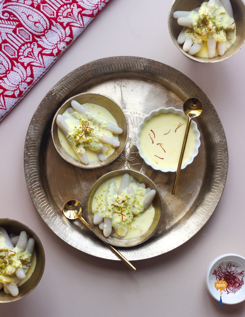 Anguli (finger) pitha with rabri