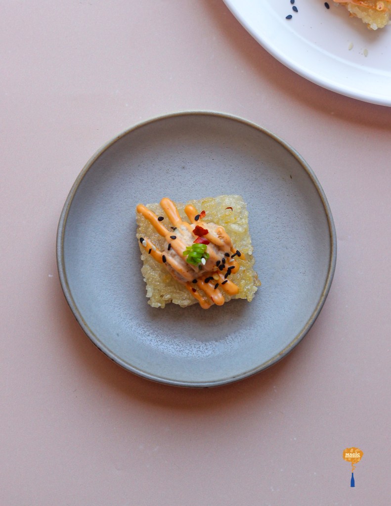 Spicy sriracha tuna with sticky rice canapés