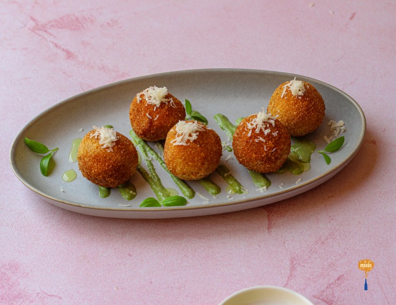 Ricotta cheese balls with basil pesto