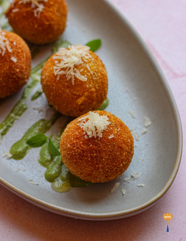Ricotta cheese balls with basil pesto