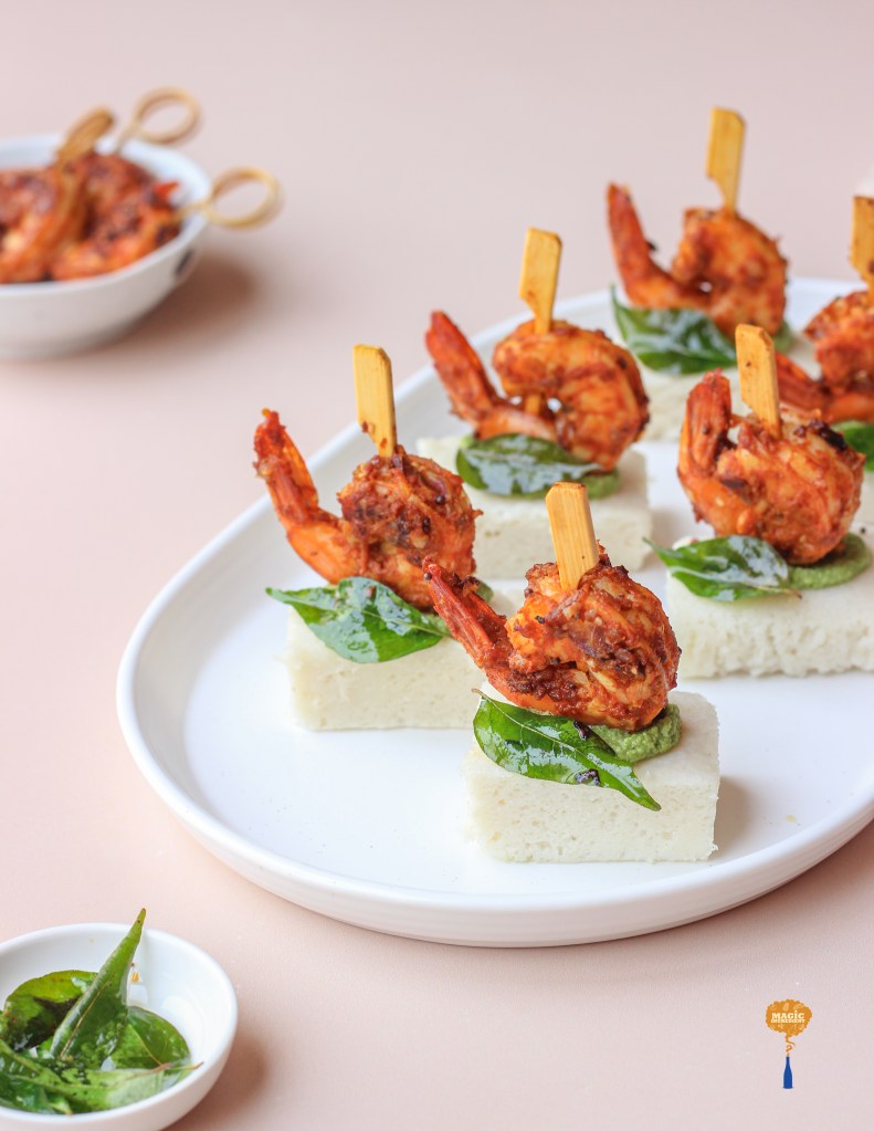 Spicy shrimps on idli base