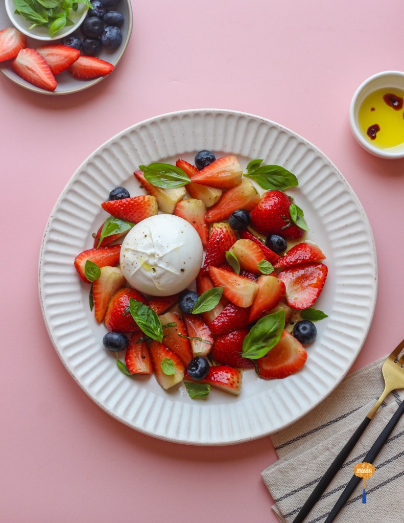 Strawberry and blueberries salad with burrata and balsamic dressing